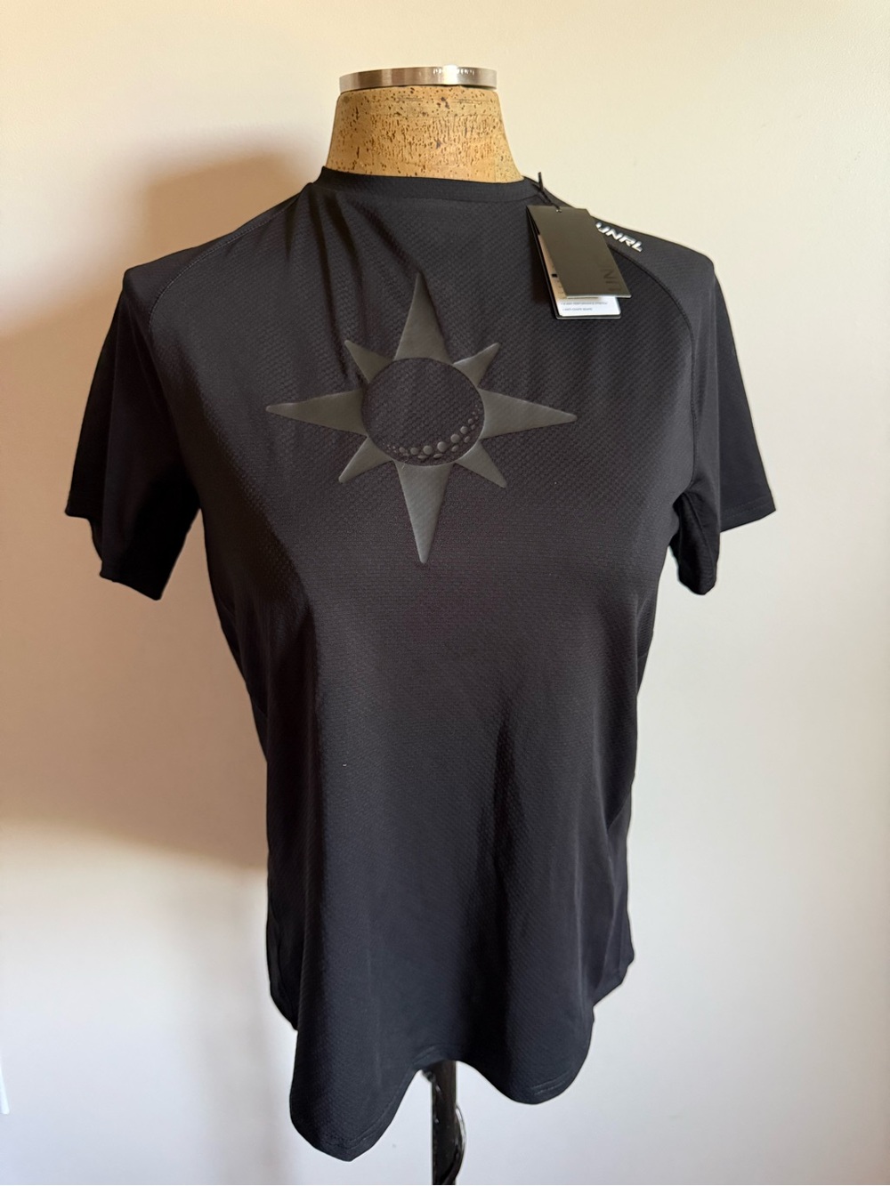 UNRL Youth Black Short-Sleeve Athletic Tee with Sun Emblem